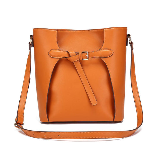 Bailey Bow Bucket Bag (Saddle) banner